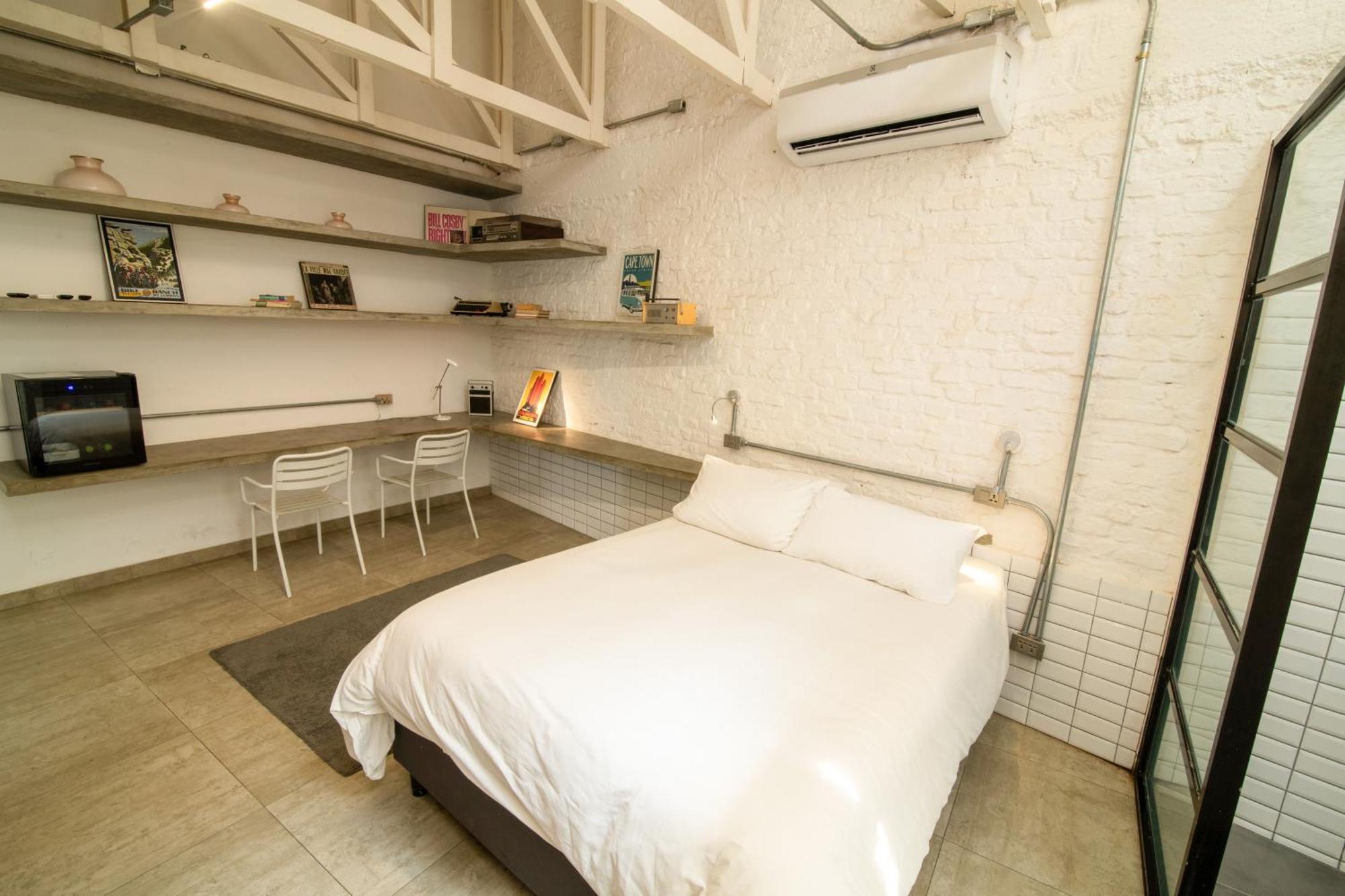 Cosmopolitano Hotel Boutique Санта-Крус-де-ла-Сьєрра Екстер'єр фото A bedroom in a micro apartment